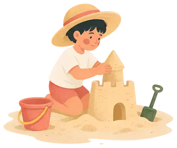 Child Building Sandcastle on Beach